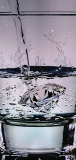 Mobile wallpaper of a diamond creating a splash in a glass of water.