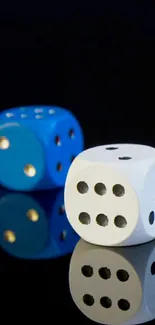 Blue and white dice reflecting on a black surface background.