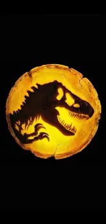 Dinosaur fossil encased in glowing amber on a black background.