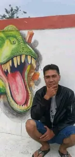 Person with T-Rex mural in the background on a wall.