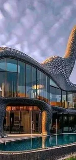 Dinosaur-shaped modern house with pool reflecting glass windows.