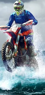 Dirt bike rider jumps through ocean waves in an exhilarating scene.