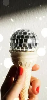 Creative wallpaper featuring a disco ball ice cream cone with light reflections.