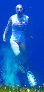 Diver exploring the deep blue ocean with vibrant underwater scenery.