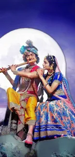 Divine couple sits under the moon in traditional attire, creating a serene ambiance.