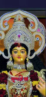 Divine goddess statue with ornate headdress.