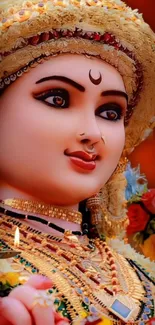 Vibrant goddess sculpture with ornate jewelry and bright colors.