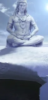 Majestic meditating statue on serene blue landscape mobile wallpaper.