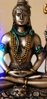 Bronze Shiva statue in meditation pose with intricate details.