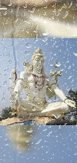 Lord Shiva statue with raindrop glass effect on a sunny day.