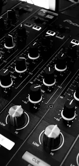 Black and white DJ mixer wallpaper for mobile device.