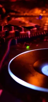 Close-up of a DJ mixer with vibrant lighting, creating a dynamic atmosphere.