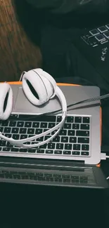 DJ setup with laptop and mixing gear for music inspiration.