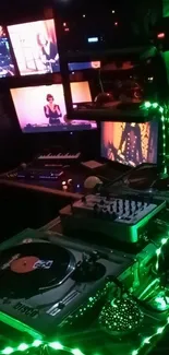 DJ setup with vibrant neon green lights and turntables.