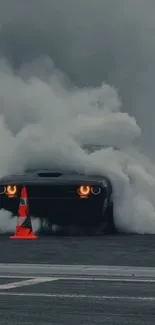 Dodge Charger performing a smoke drift on a racetrack.