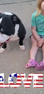 Child and dog enjoying outdoor play with 'Love' text.