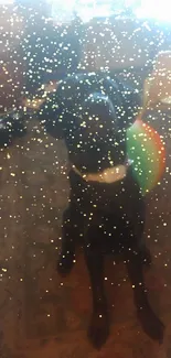 Dark brown dog with a rainbow ball and sparkling effect wallpaper.