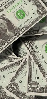 Pile of US dollar bills laid out creating a striking money-themed mobile wallpaper.
