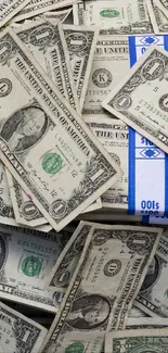 Mobile wallpaper of scattered U.S. dollar bills symbolizing wealth.