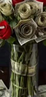 Bouquet of roses made from dollar bills and red flowers in a vase.