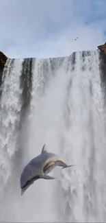 Dolphin leaping by a large waterfall with a clear sky backdrop.