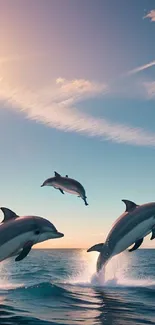 Three dolphins leap joyfully in the ocean at sunset, creating a serene scene.