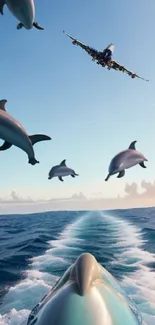 Dolphins leap through the sky with a jet above ocean waves.