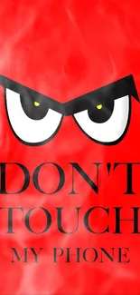 Don't Touch My Phone angry eyes wallpaper in bold red background.