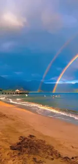 Beautiful double rainbow over a tranquil beach setting