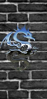 Metallic dragon emblem on gray brick background wallpaper.