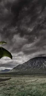 Dragon flying over dark, moody mountains with stormy clouds.