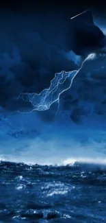 Dark stormy ocean with blue lightning in the night sky wallpaper.