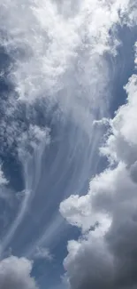 Dramatic clouds in a blue sky wallpaper.