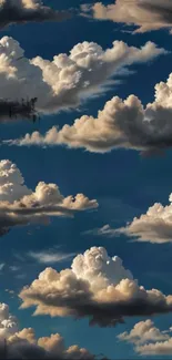 Dramatic clouds against vivid blue sky creating stunning wallpaper.