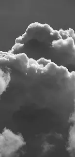 Black and white mobile wallpaper of dramatic clouds.