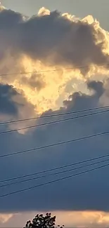 Dramatic sunset sky with clouds and silhouetted trees.