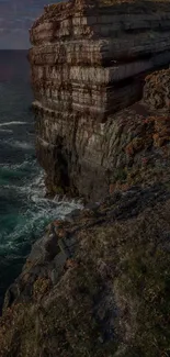 Stunning coastal cliff with ocean waves.