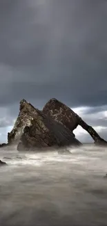 Dramatic stormy coastal landscape with rock formations.