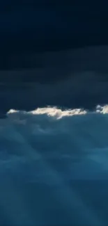 Dramatic dark clouds with light breaking through.