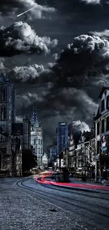 Dramatic Gothic cityscape with night sky and street lights.