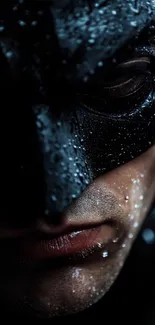 Close-up of a masked hero under rain.