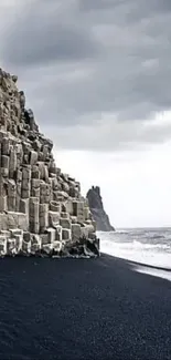 Basalt cliffs and black sand beach in Iceland.