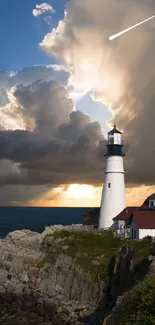 Lighthouse with dramatic sunset and ocean waves.