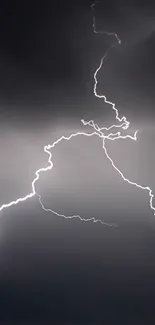 Dynamic lightning bolt against a dark sky.