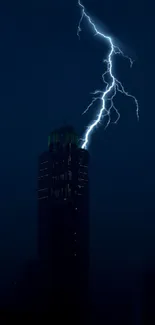 Lightning striking a skyscraper at night, illuminating the dark skyline.