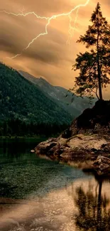 Lightning over mountain landscape with a lone tree and serene water reflection.