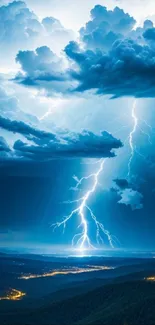 Lightning storm over a valley with dramatic clouds and blue sky.