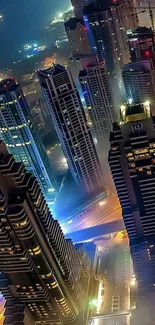 Aerial nighttime cityscape with illuminated skyscrapers and vibrant lights.