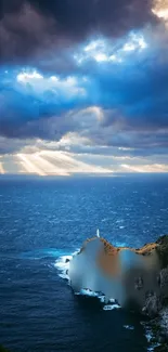 Dramatic sky over ocean with lighthouse and sun rays.