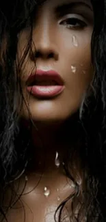 Dramatic close-up portrait of a wet woman with vibrant lips.